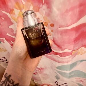 Gucci Pour Homme Black and Silver Bottle